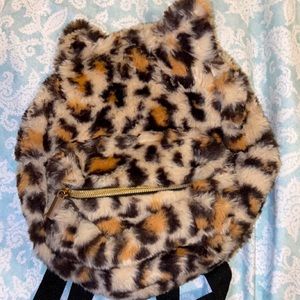 Claire’s mini leopard bag